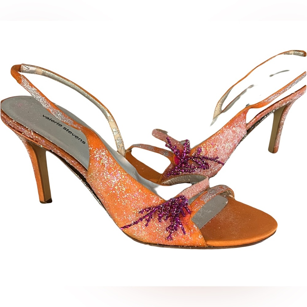 Valerie Steven’s orange glitter stiletto sandals with pink embellishment.